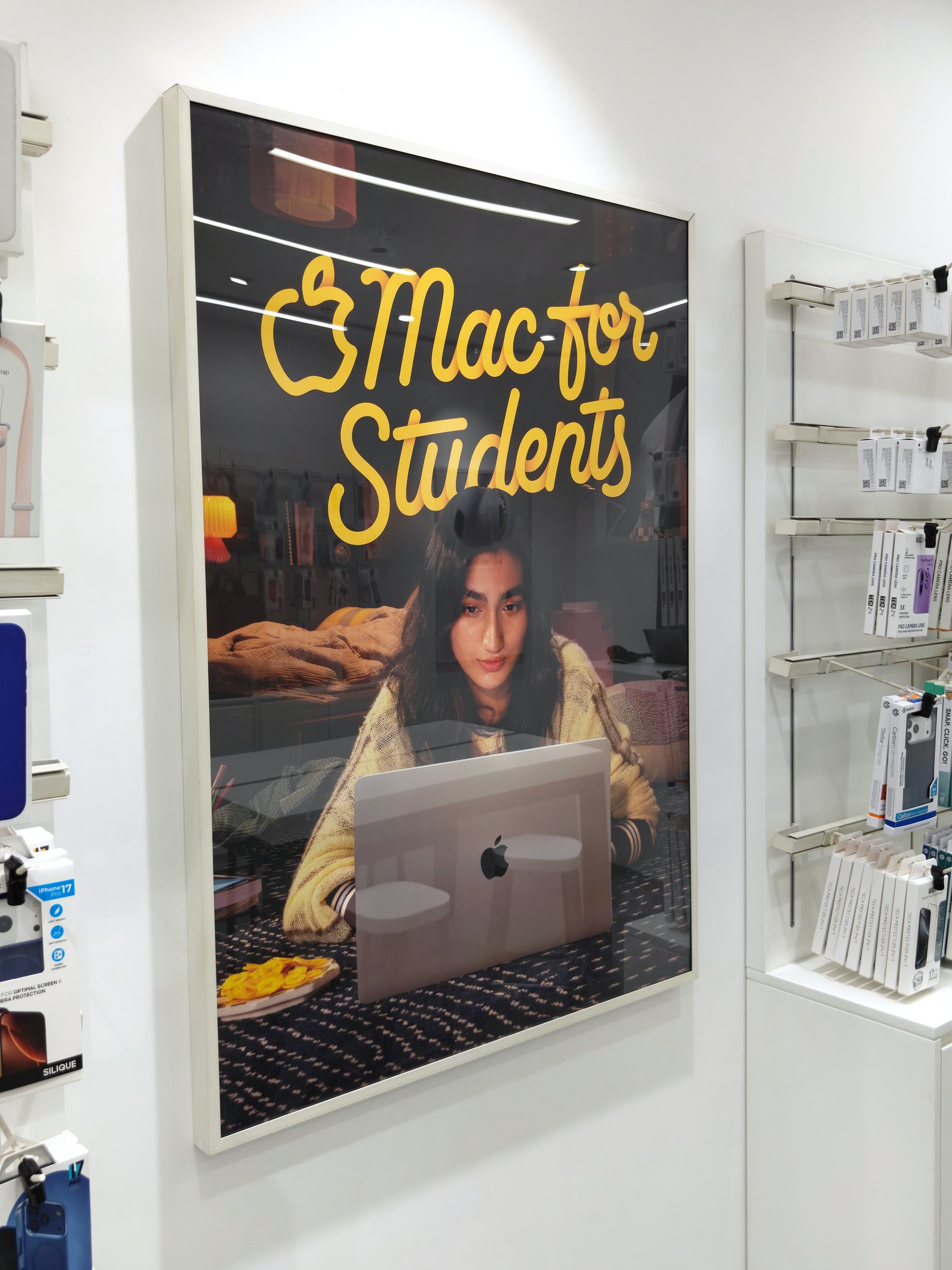 Mac for Students 2026 vertical poster in a retail store